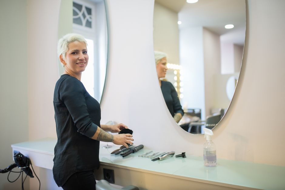 Woman in a salon setting getting ready