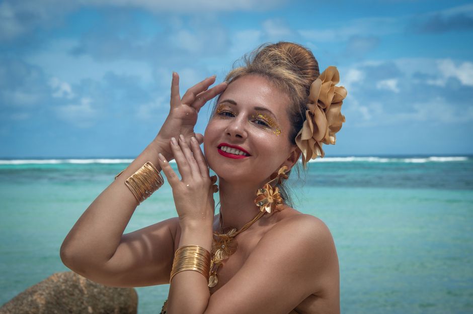 Woman with confident golden tan at the beach